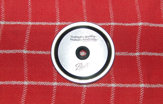 Grommet in mason jar lid